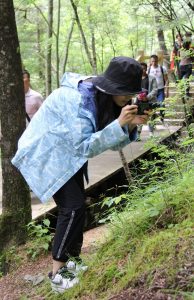Yichen Li photographing insects, one of her favorite hobbies