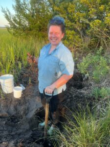 Caitlin BrabbleRose collecting ovigerous fiddler crabs in Oyster Landing at the Belle Baruch Marine Field Station.